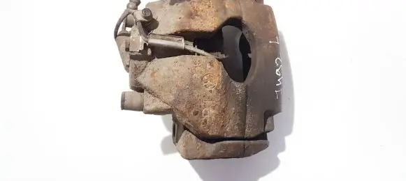 Volkswagen Touareg I Front brake caliper 7l6105d
