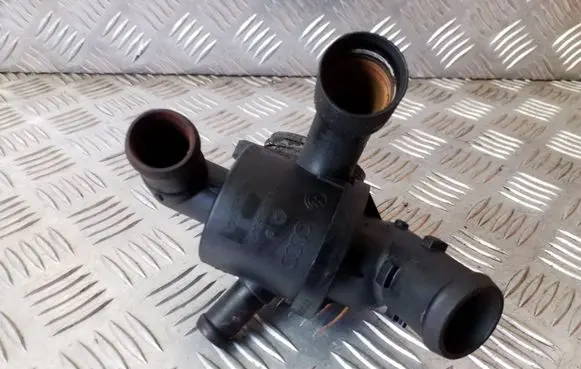 Thermostat/thermostat housing