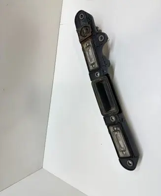 Trunk door license plate light bar