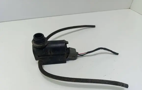 KIA Carens I Windscreen/windshield washer pump 7305J18