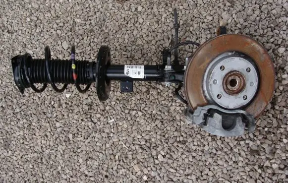 Peugeot 208 Front shock absorber with coil spring 9831167880