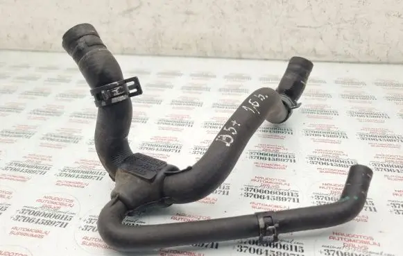 Volkswagen PASSAT B5.5 Engine coolant pipe/hose 06B121058AT 06B121058A