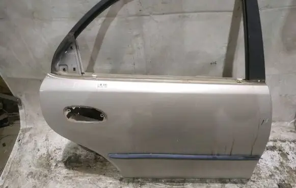Mazda 323 Rear door RUDOS