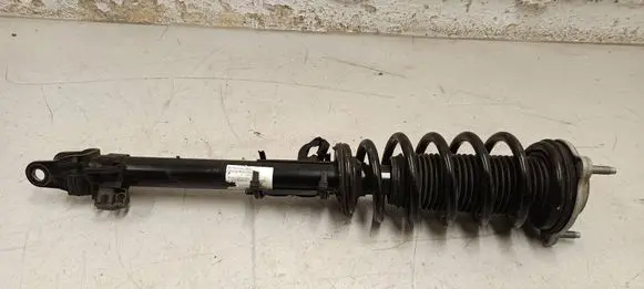 Front shock absorber with coil spring