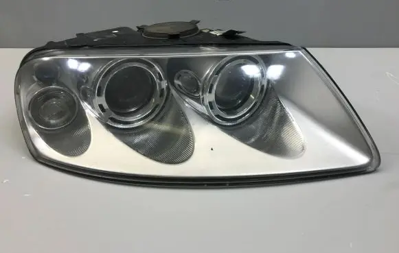 Volkswagen Touareg I Headlight/headlamp 7L6941016BK 89307861