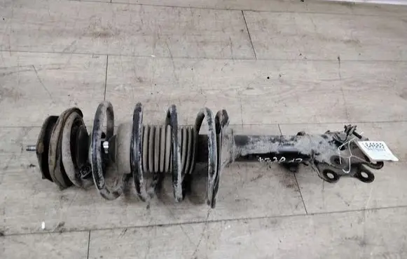 Nissan Almera Tino Front shock absorber with coil spring