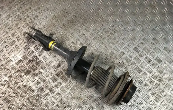 Subaru Legacy Front shock absorber with coil spring G8249L