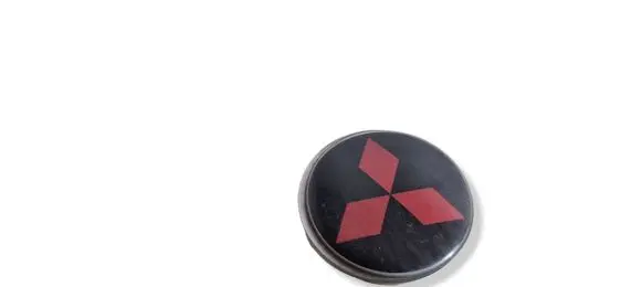 Mitsubishi Grandis Original wheel cap 74404