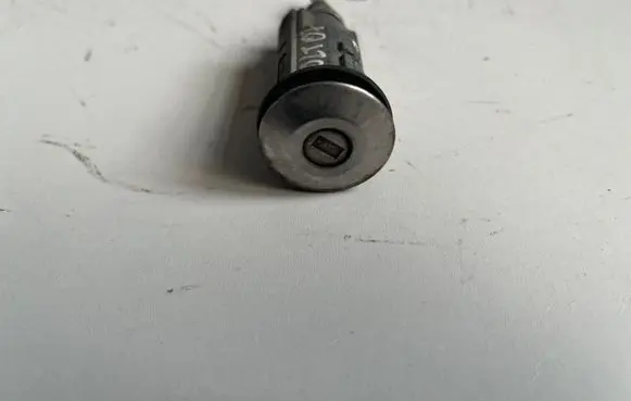Mitsubishi Colt Front door lock (next to the handle) 