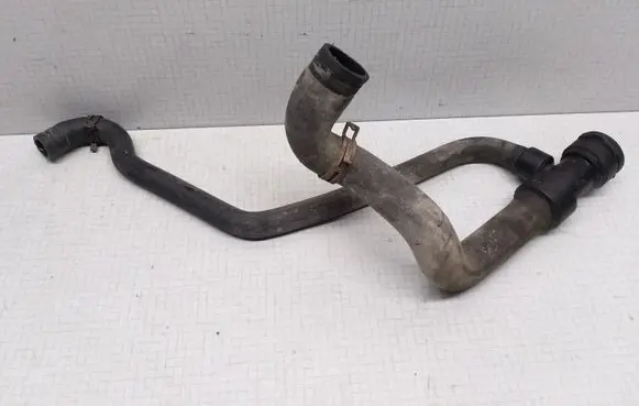 Volkswagen PASSAT B5 Engine coolant pipe/hose 8D0121055F