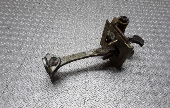 Front door check strap stopper