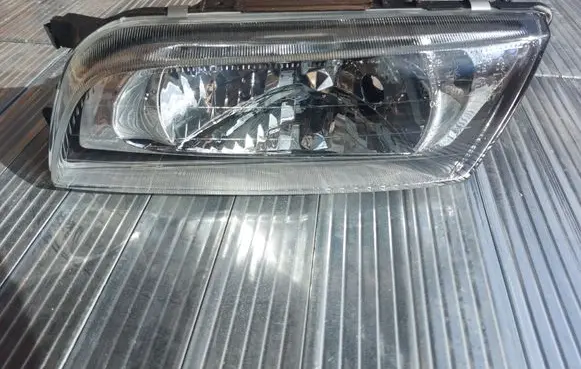 Nissan Almera Headlight/headlamp 2151178LLDEM 260602N328