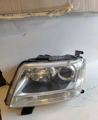 Suzuki Grand Vitara II Headlight/headlamp 10059079