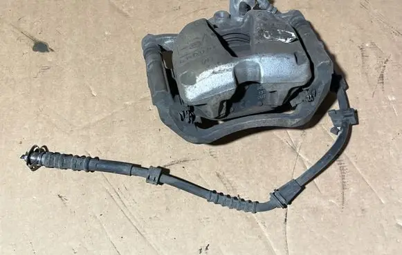 Peugeot 5008 II Front brake caliper 1623162080