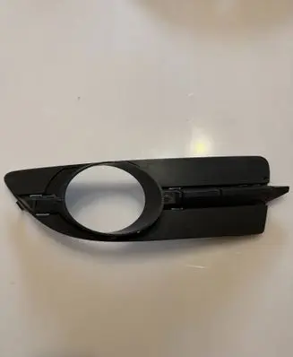 Volkswagen Eos Front fog light trim/grill 1Q0853665B M59210