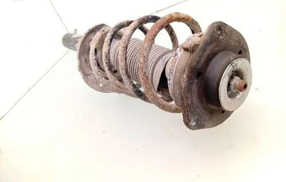 Volkswagen Golf VI Front shock absorber with coil spring 