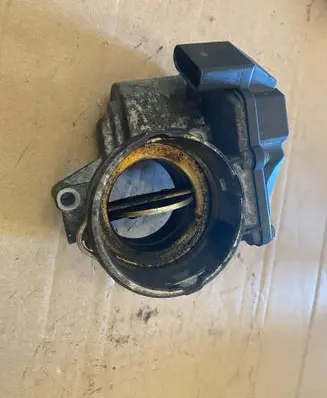 Volkswagen Touran I Throttle valve 03G128063G
