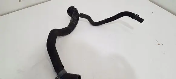 Volkswagen Golf VII Engine coolant pipe/hose 5Q0122157AK