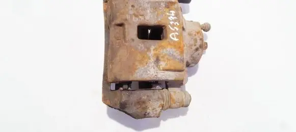 Mazda 323 F Front brake caliper