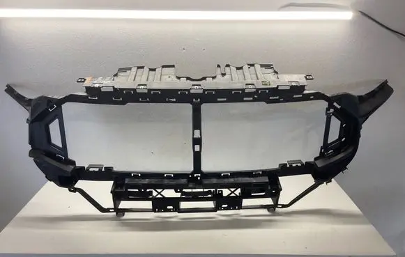Radiator support slam panel