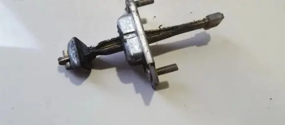 Mazda 323 Rear door check strap stopper