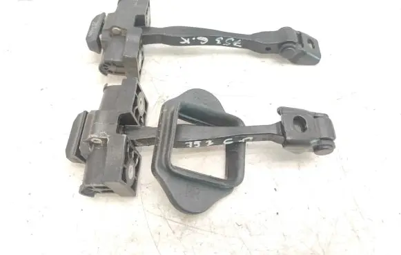 Rear door check strap stopper
