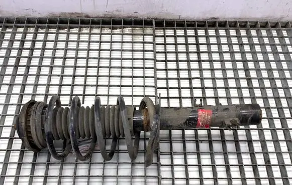 Peugeot 208 I Front shock absorber/damper 