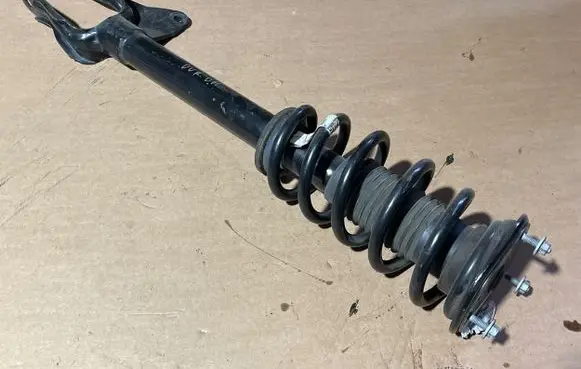 Dodge Durango III Front shock absorber with coil spring 55553E 1A18530A 68280980AB