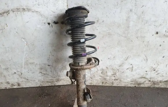 Front shock absorber with coil spring