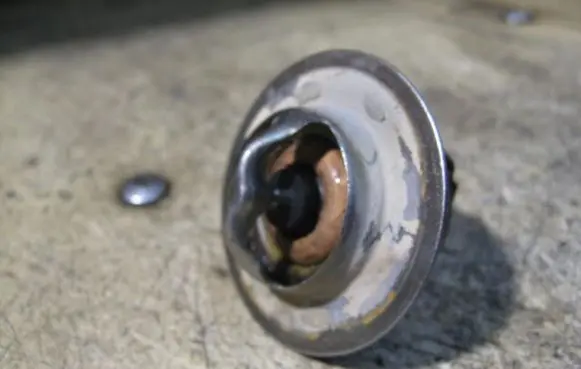 Thermostat/thermostat housing