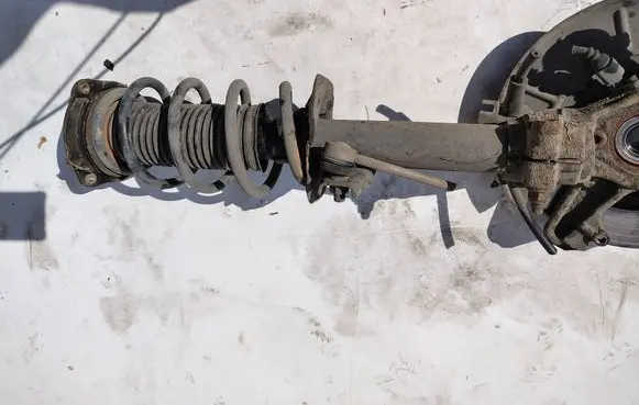 Volkswagen Golf VI Front shock absorber with coil spring 