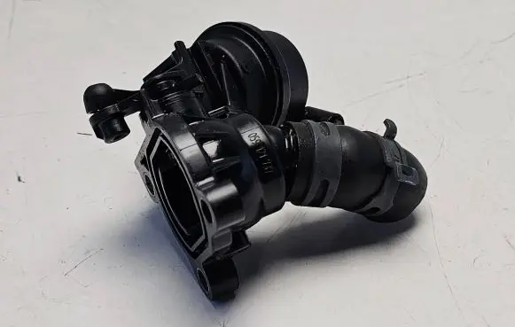Thermostat/thermostat housing