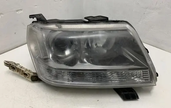 Suzuki Grand Vitara II Headlight/headlamp 10059083