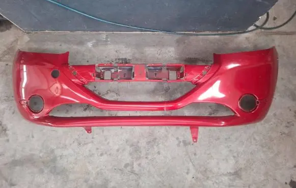 Peugeot 208 I Front bumper 