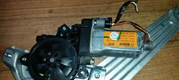 Rear door window regulator motor
