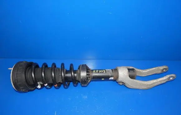 Jaguar XF X260 Front shock absorber with coil spring