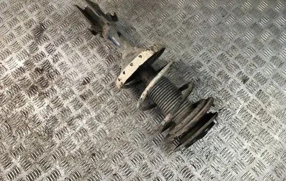 Subaru Legacy Front shock absorber with coil spring
