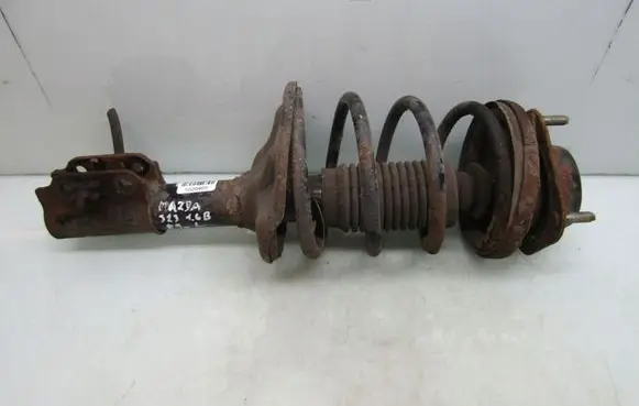 Mazda 323 Front shock absorber with coil spring 32316B89