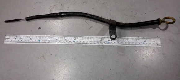 Oil level dip stick