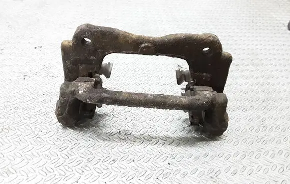 Toyota Avensis T250 Brake caliper pad carrier rear 