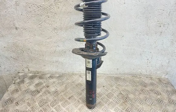 Volkswagen Touran III Front shock absorber with coil spring 5QA413031AB 5QA412021CM