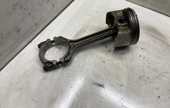 Piston with connecting rod