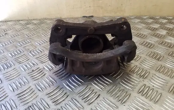 Nissan Juke I F15 Front brake caliper