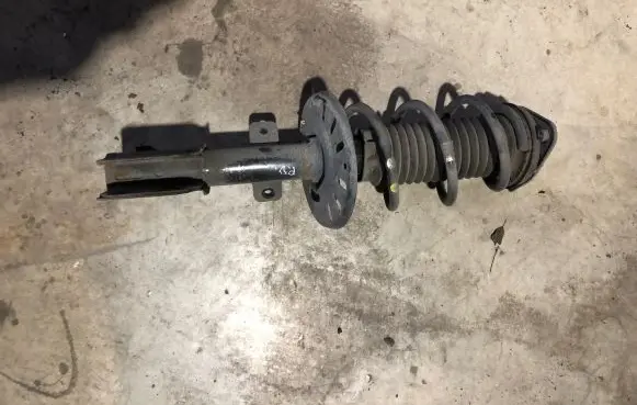Citroen Berlingo Front shock absorber with coil spring 9833305980