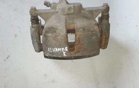 Seat Alhambra (Mk2) Front brake caliper 7N0615124
