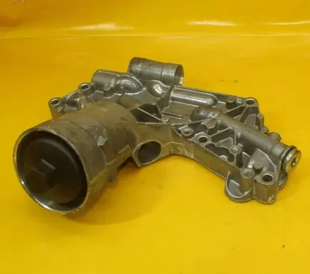 Opel Astra J Engine oil radiator 55355699 55355601 987089151