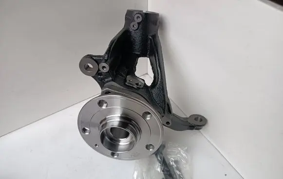 Front wheel hub spindle knuckle