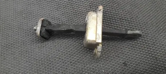 Volvo S40, V40 Rear door check strap stopper