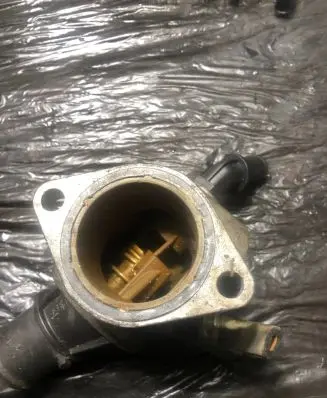Thermostat/thermostat housing