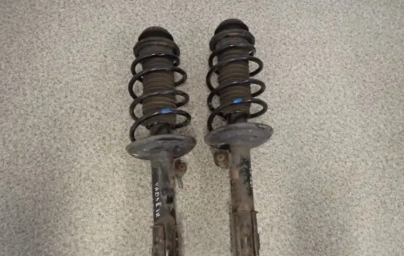 Toyota Yaris Front shock absorber with coil spring